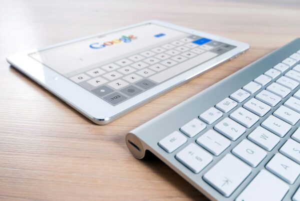 Silver ipad with google screen